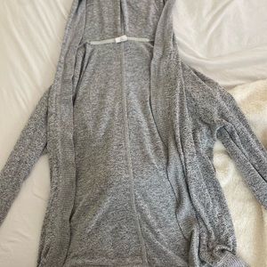 Grey cardigan.